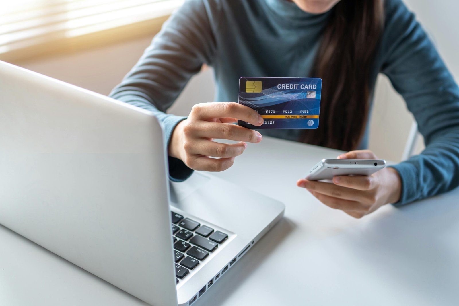 A person using a smartphone to shop online through social media apps with shopping cart icons