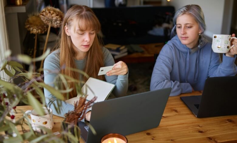 Illustration of a person using ClickBank to earn money online in 2025, featuring a laptop with charts and digital product listings
